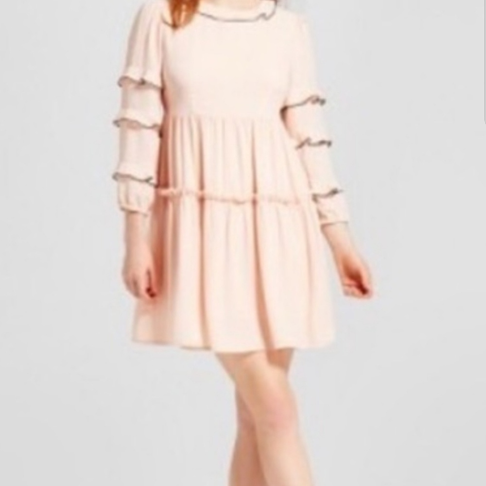 Peach ruffle dress: donated!